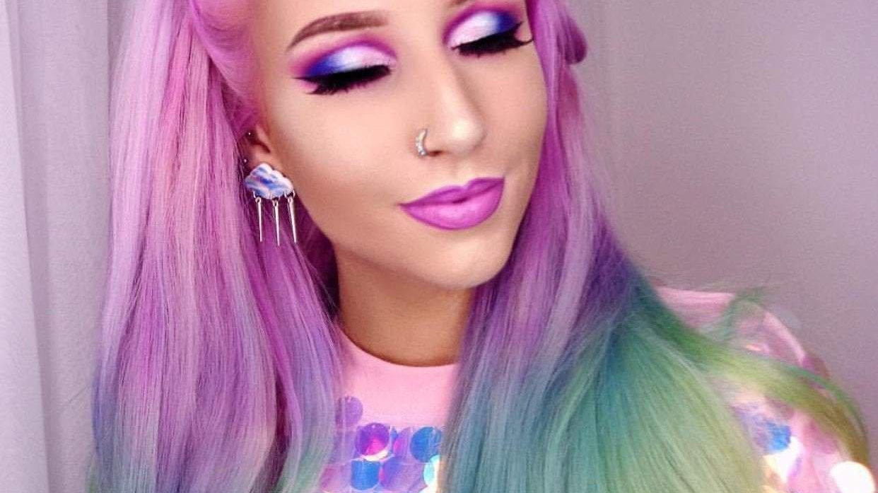 Amy the Mermaid wears Suzywan Deluxe Earrings - Spoiled Brat