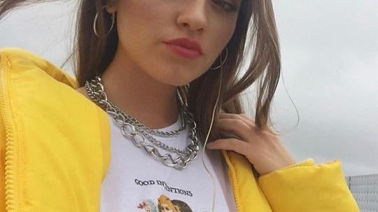 Emily Middlemas wears our Petals & Peacocks T-Shirt-Spoiled Brat