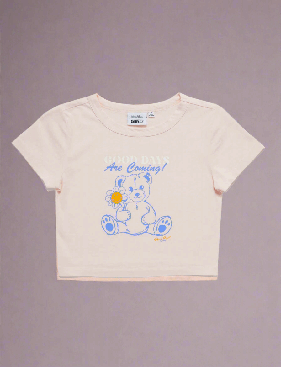 Samii Ryan x Smileyworld® Good Days Baby Tee T-Shirt by Samii Ryan as seen on celebrities