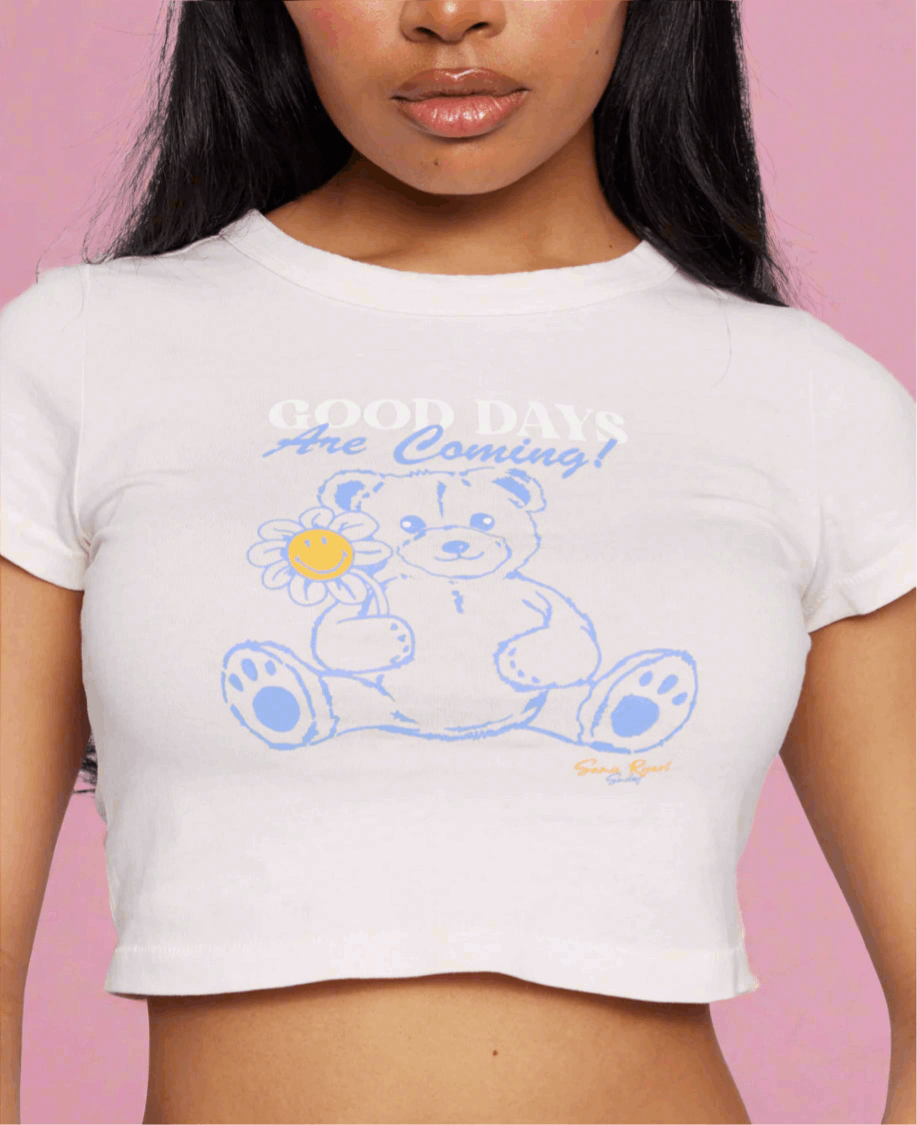 Samii Ryan x Smileyworld® Good Days Baby Tee T-Shirt by Samii Ryan as seen on celebrities
