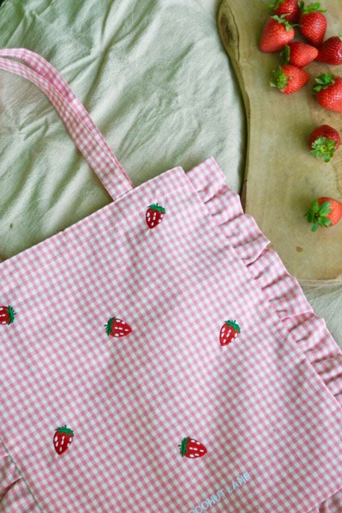 Coconut Lane Strawberry Picnic Tote Bag Tote Bag by Coconut Lane as seen on celebrities