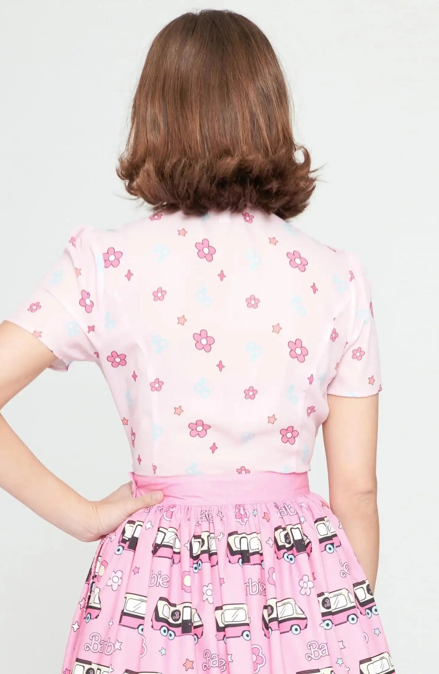 Barbie X Unique Vintage 1970s Pink Barbie Floral Print Bow Blouse Blouse by Unique Vintage as seen on celebrities