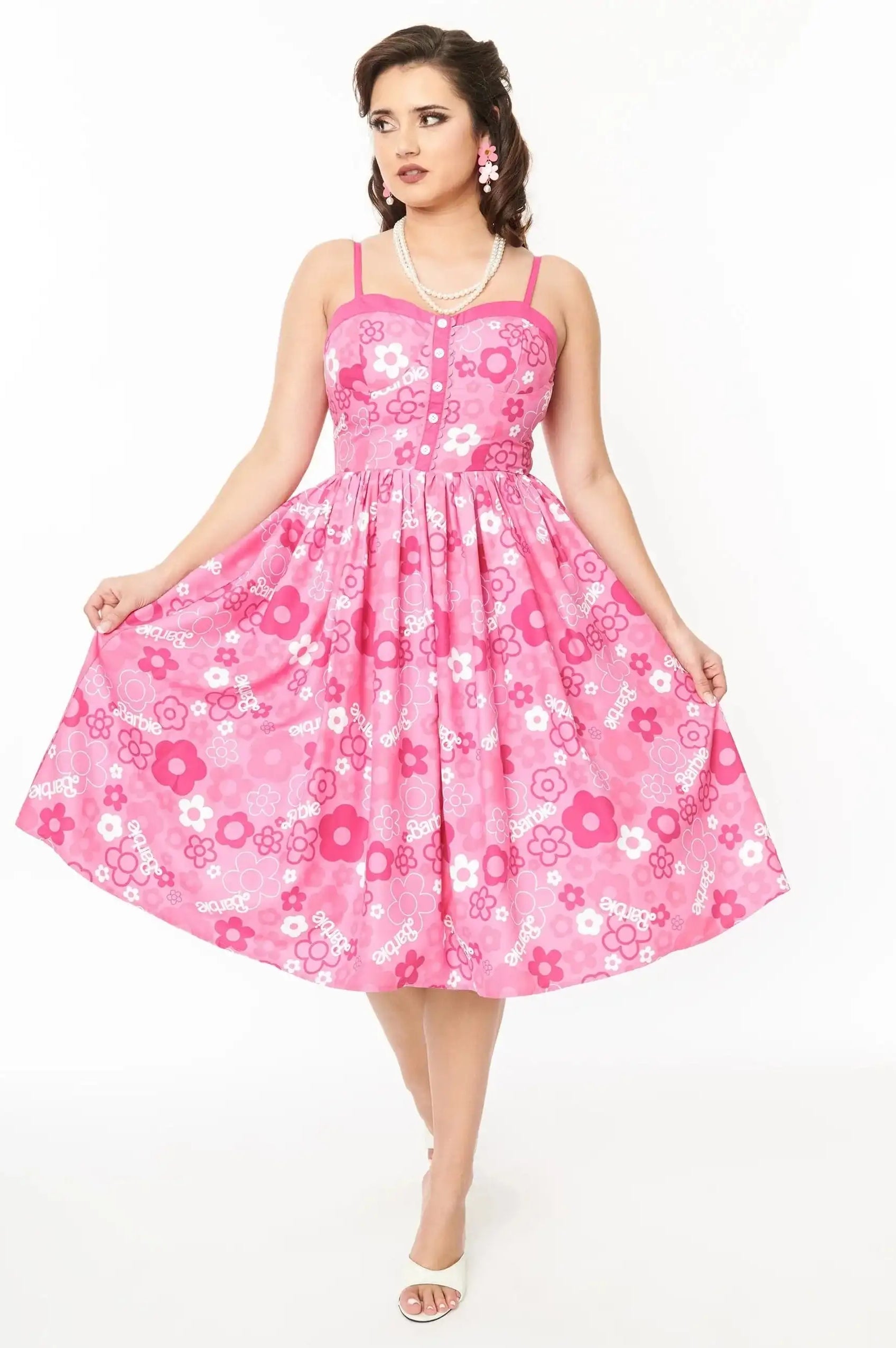 Barbie X Unique Vintage Pink Barbie Print Swing Dress Dress by Unique Vintage as seen on celebrities