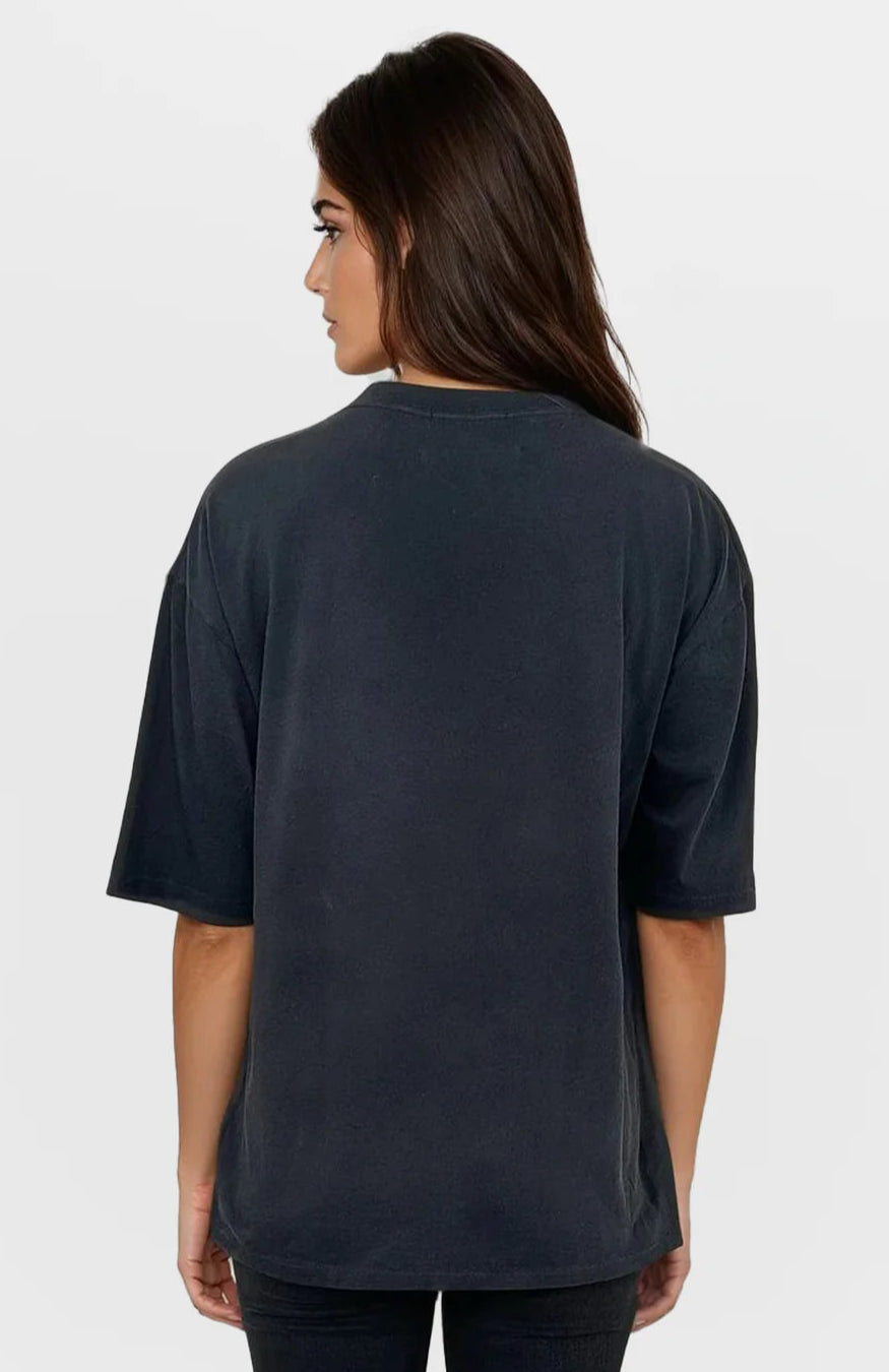 Person wearing a black t-shirt on a white background