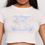 Samii Ryan x Smileyworld® Good Days Baby Tee T-Shirt by Samii Ryan as seen on celebrities