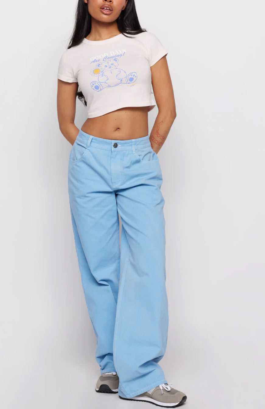 Samii Ryan x Smileyworld® Good Days Baby Tee T-Shirt by Samii Ryan as seen on celebrities