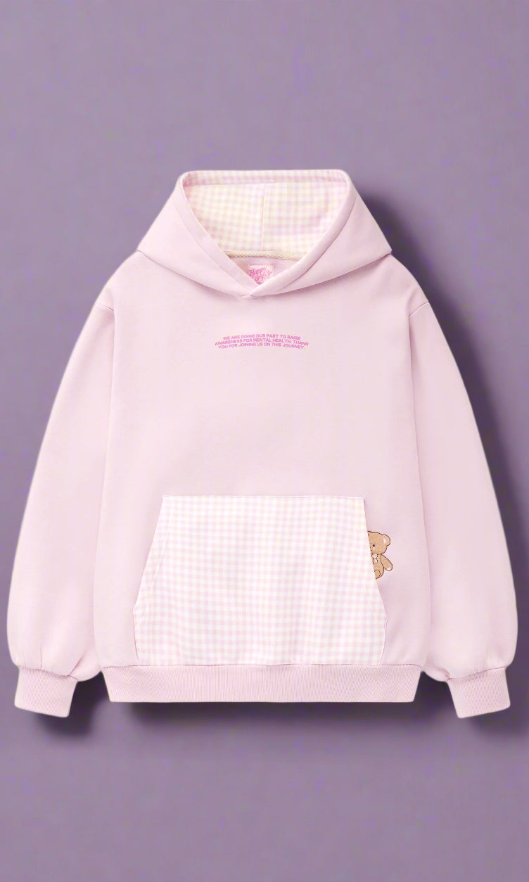 Pink hoodie with a checkered front panel and butterfly design on a white background