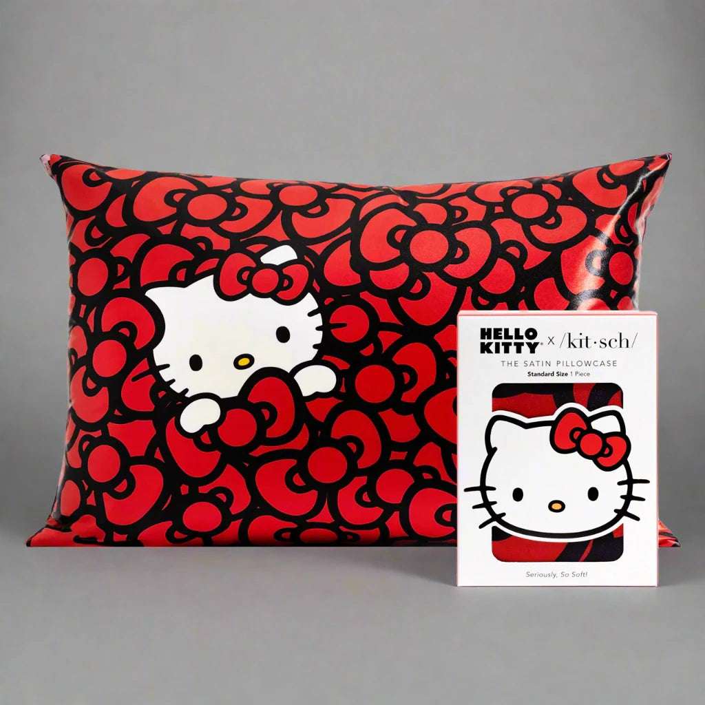 Hello Kitty x Kitsch Satin Pillowcase - Hello Kitty Bathes in a Sea of Bows Pillow by Kitsch as seen on celebrities