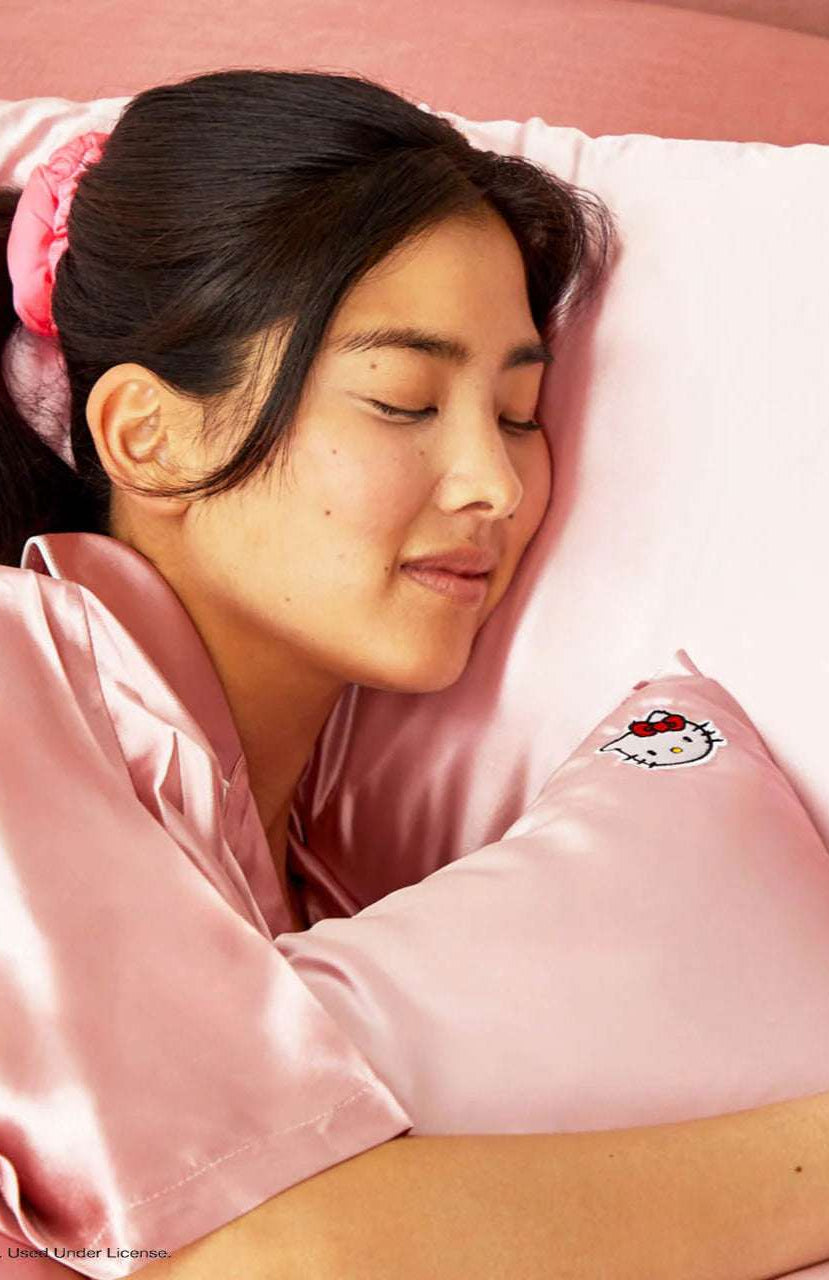 Hello Kitty x Kitsch Satin Pillowcase - Solid Pink Hello Kitty Face Pillow by Kitsch as seen on celebrities