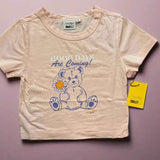 Samii Ryan x Smileyworld® Good Days Baby Tee T-Shirt by Samii Ryan as seen on celebrities