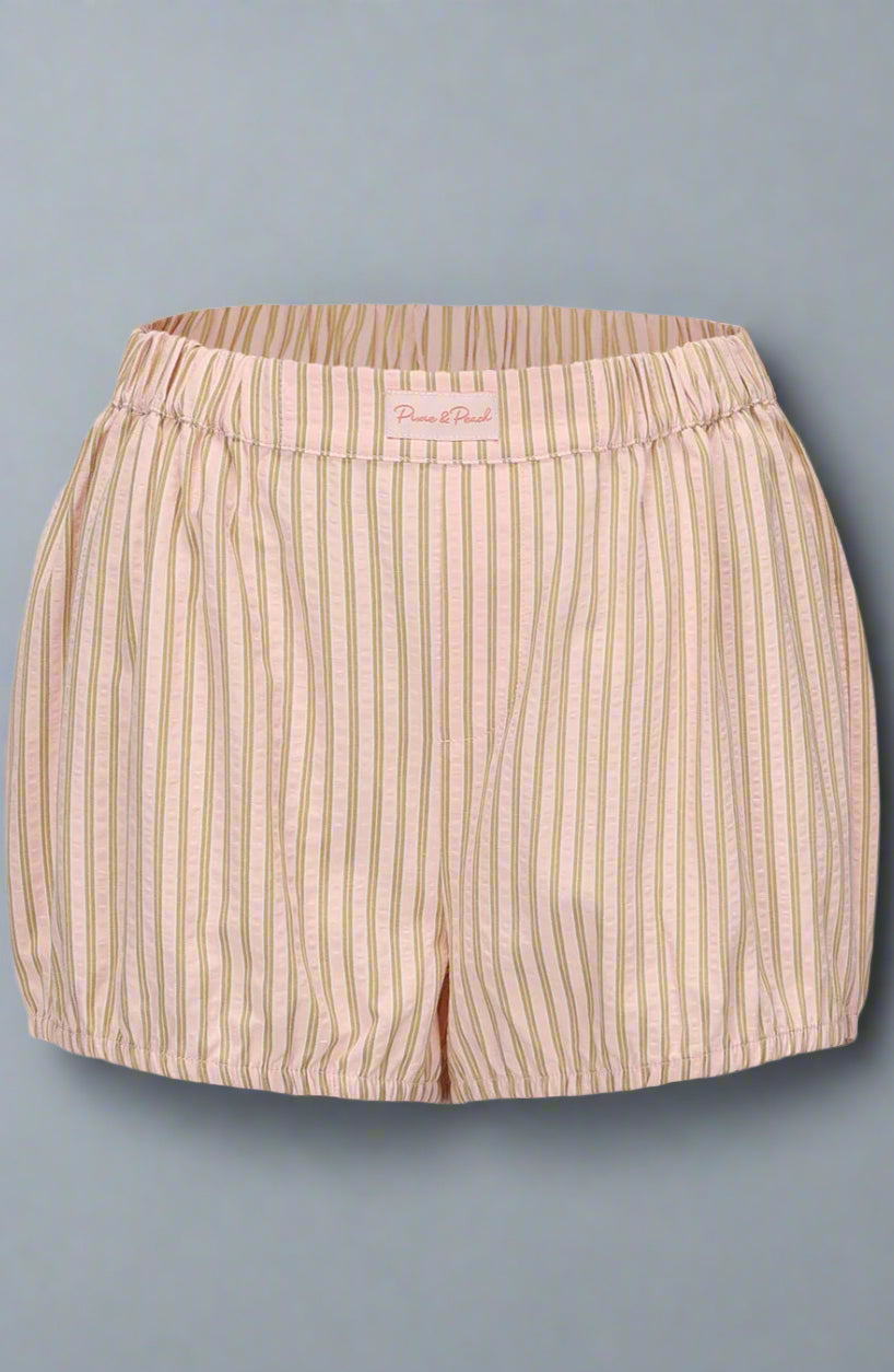 Beige striped shorts on a light gray background