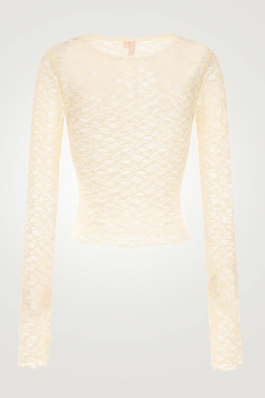 Light yellow textured cardigan on a light gray background