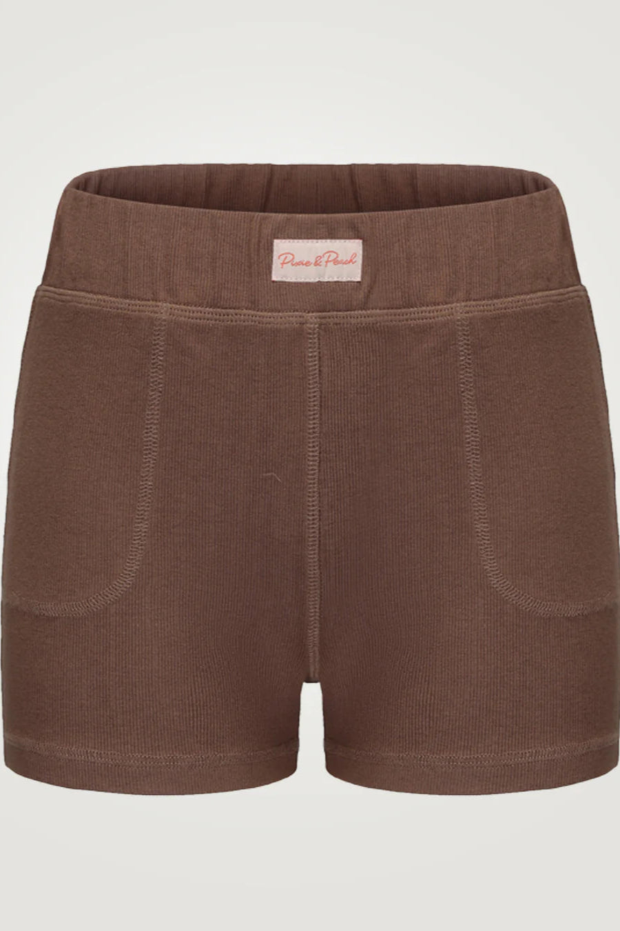 Brown shorts with a visible brand label on a light gray background
