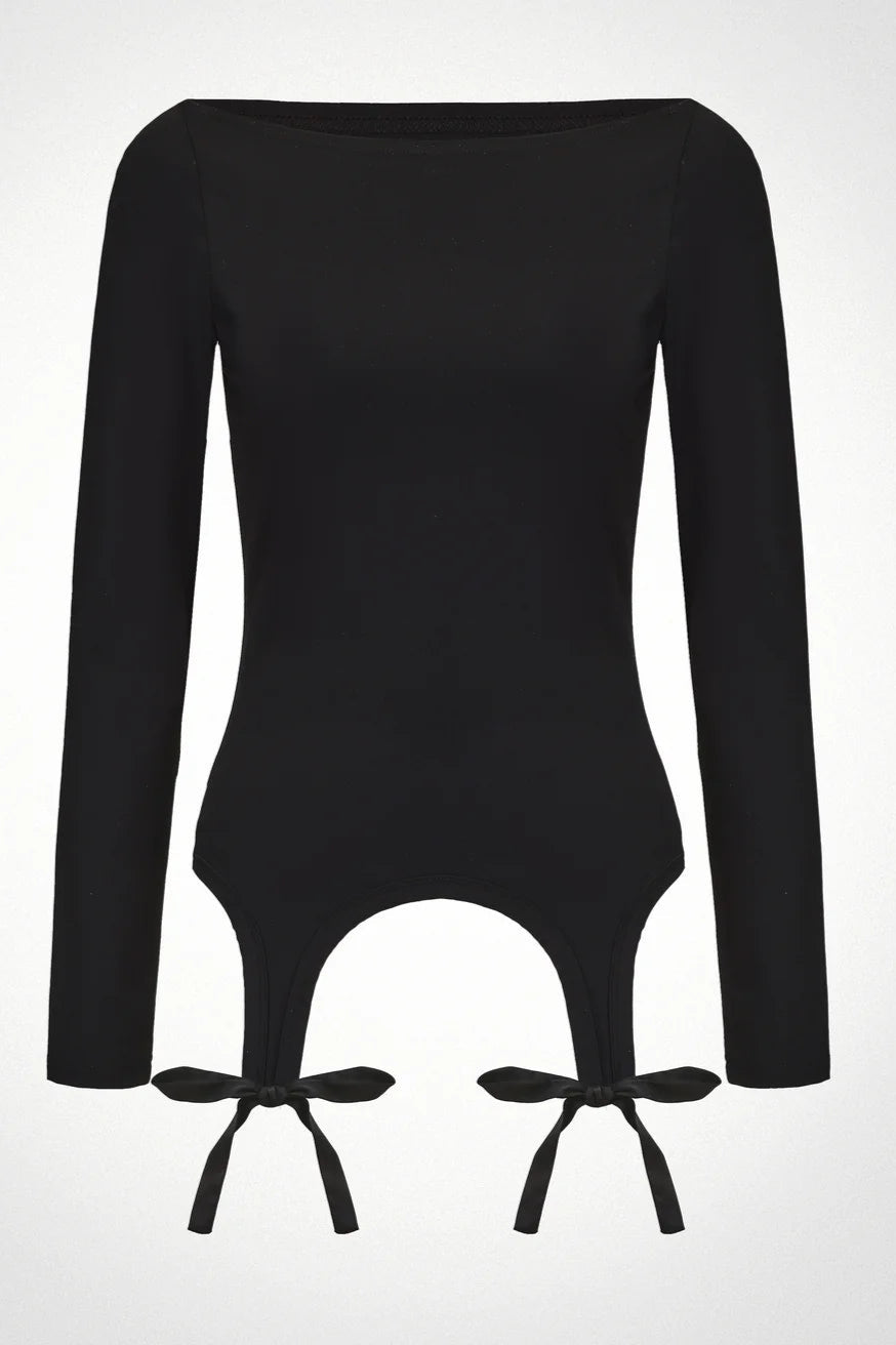 Black long-sleeve top with cut-out design and tie details on a white background