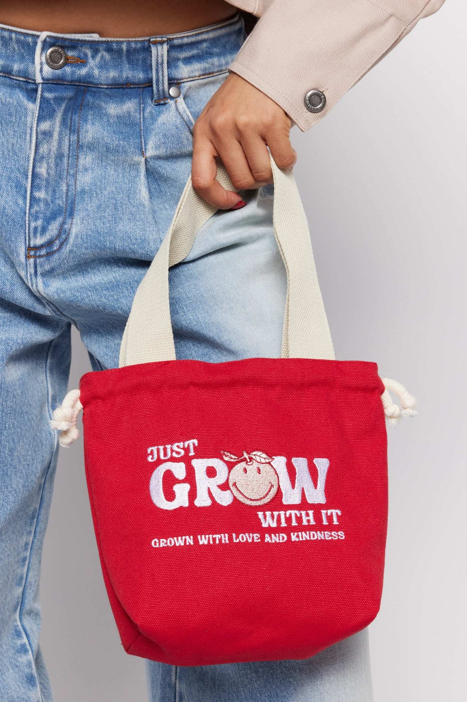 Samii Ryan x Smiley® Just Grow With It Bucket Bag Clutch Bag by Samii Ryan as seen on celebrities