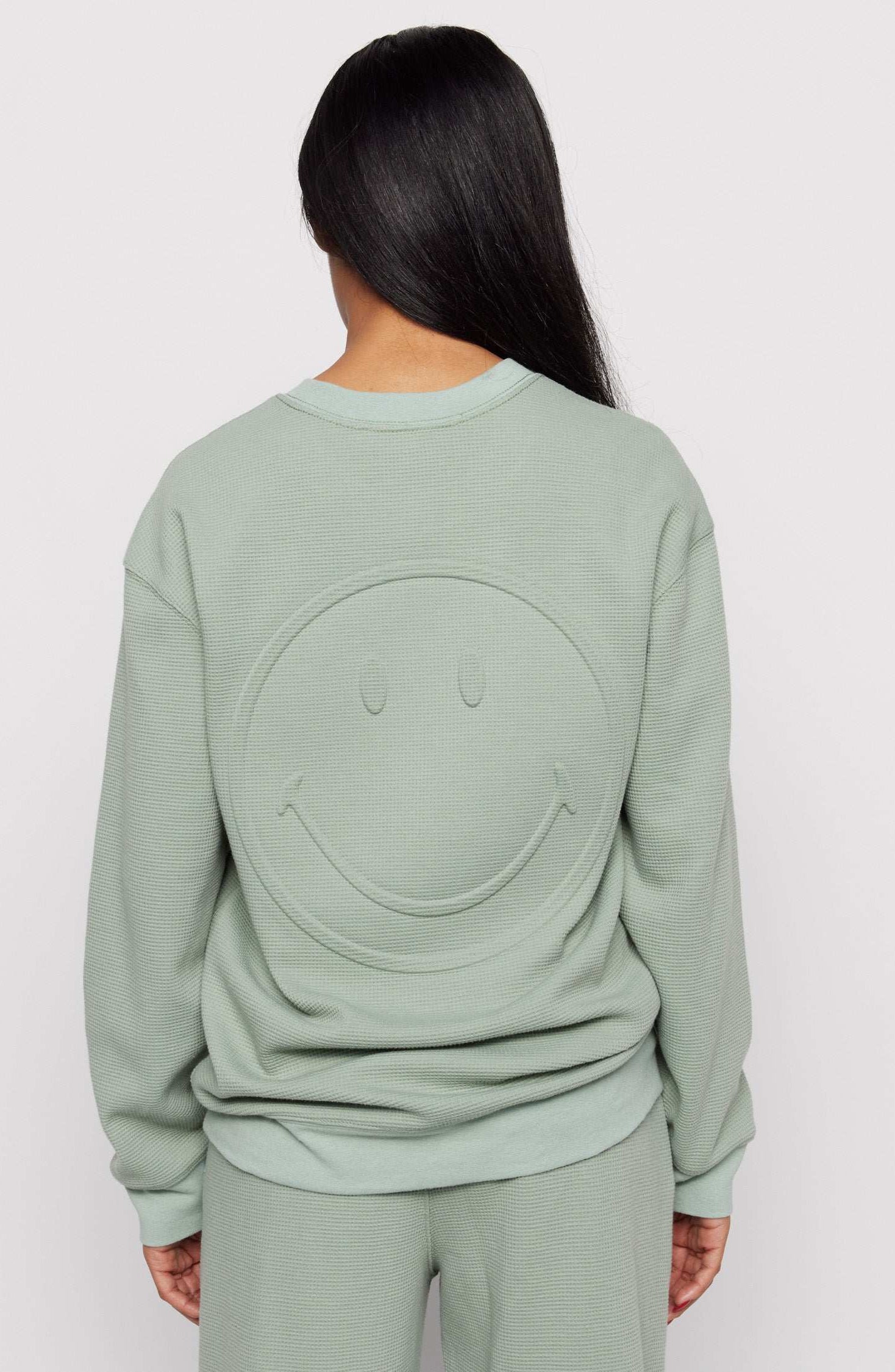 Samii Ryan Smiley® Thermal Crewneck Sweatshirt by Samii Ryan as seen on celebrities