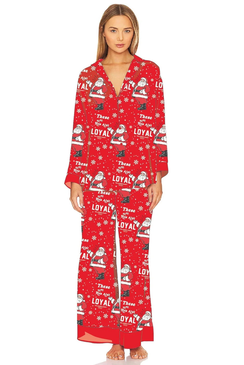 Woman wearing a red pajama set with festive pattern on a white background