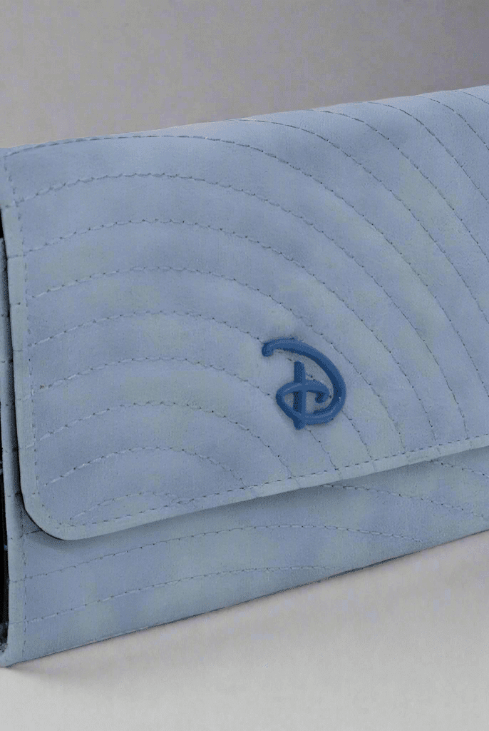 Shop Buckle Down Products Buckle Down Disney Logo Sky Blue Fold Over Wallet Wallet for women – premium loungewear and festival fashion at Spoiled Brat