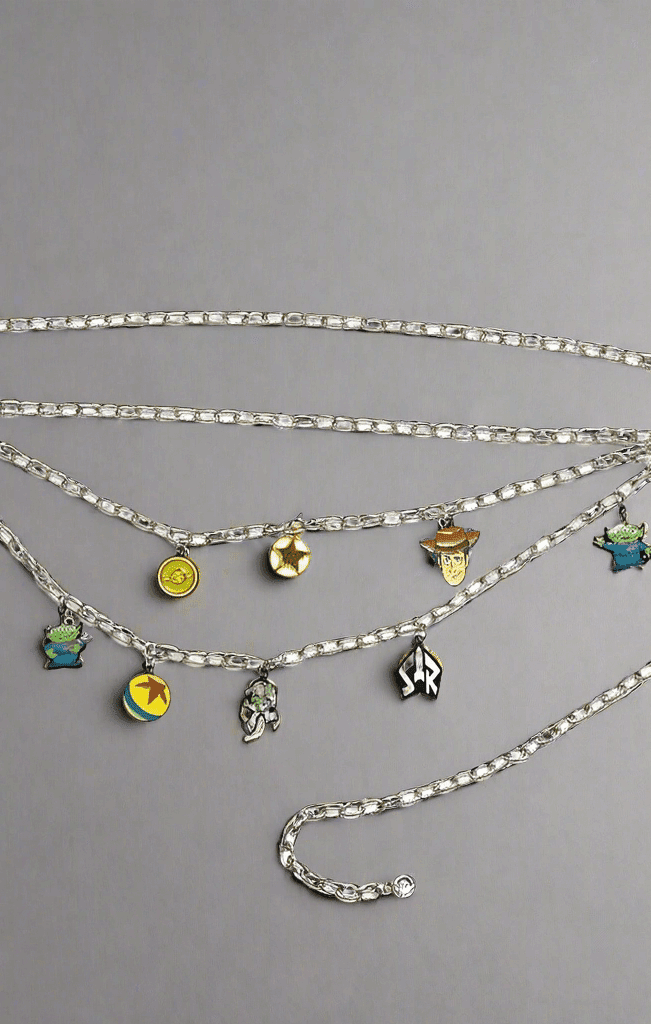 Shop Buckle Down Products Buckle Down Products Disney Toy Story Charm Chain Belt Belt for women – premium loungewear and festival fashion at Spoiled Brat