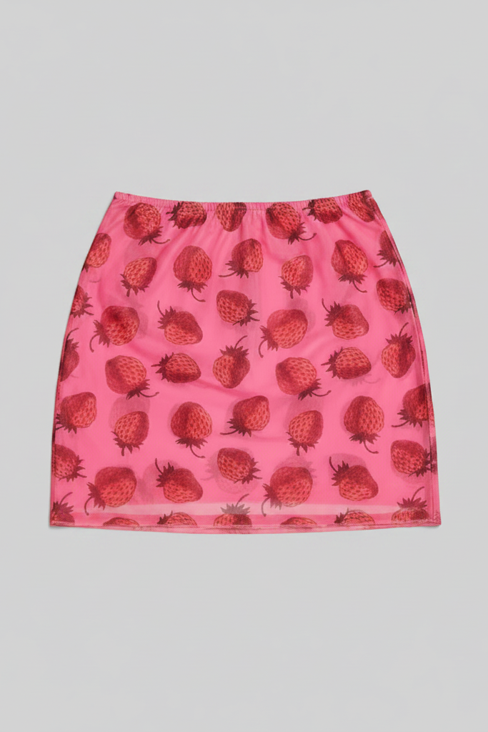 Pink skirt with strawberry pattern on a pink background