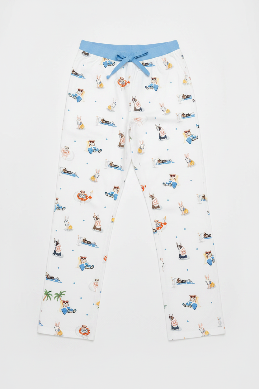 White pajama pants with cartoon character print on a white background