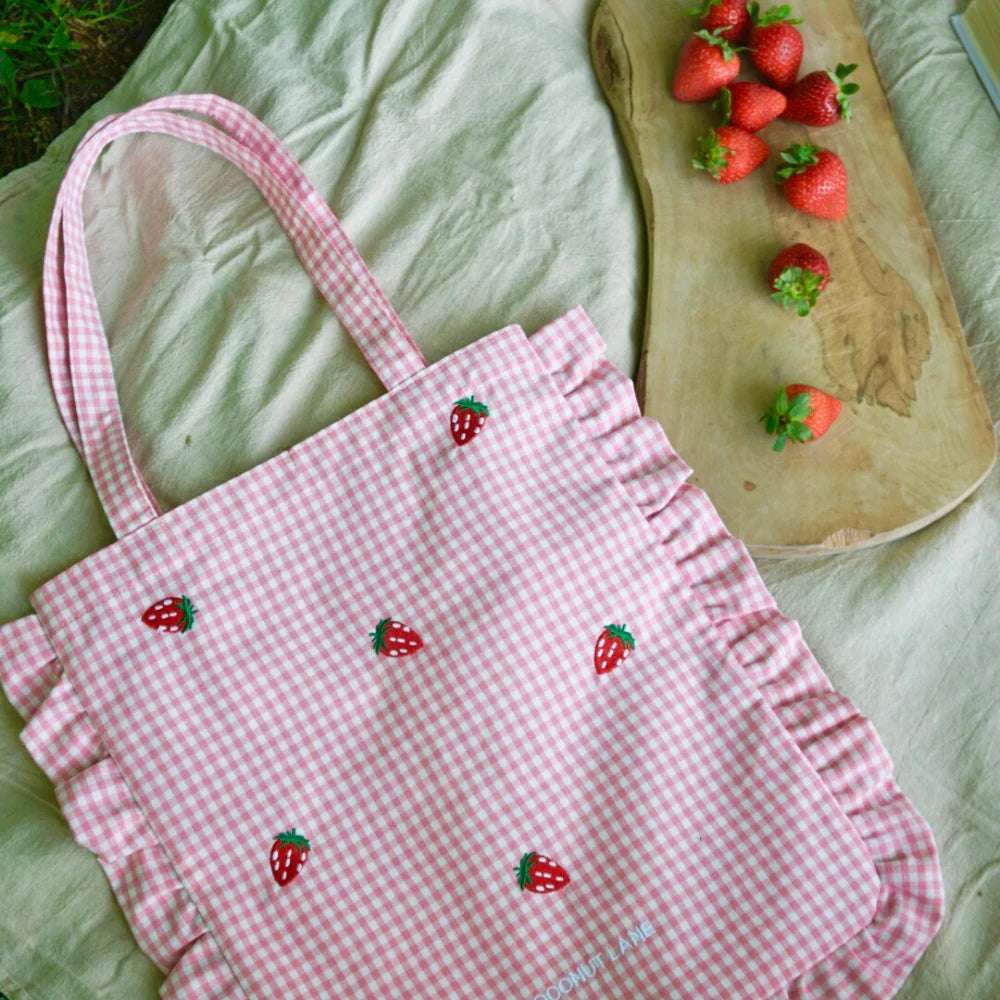 Shop Coconut Lane Coconut Lane Strawberry Picnic Tote Bag Tote Bag for women – premium loungewear and festival fashion at Spoiled Brat