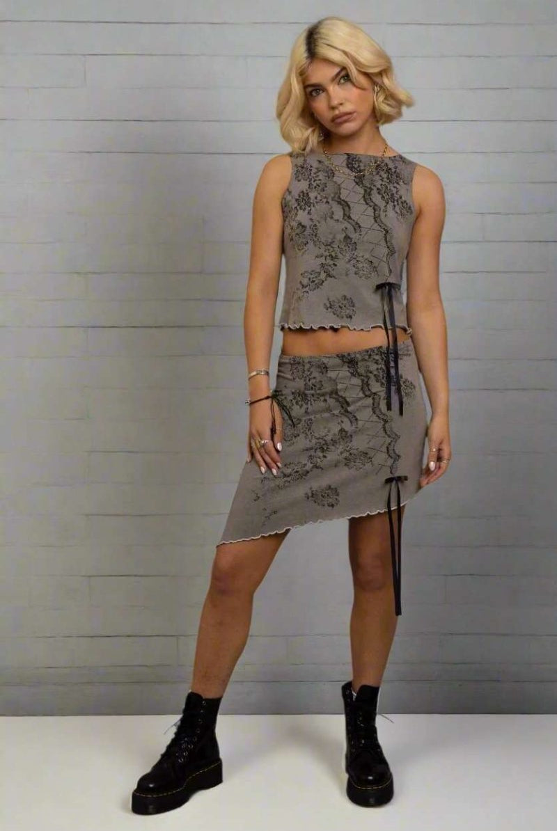Shop Daisy Street Daisy Street Asymmetrical Skirt with Print & Bow Detail Mini Skirt for women – premium loungewear and festival fashion at Spoiled Brat