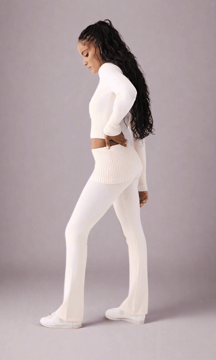 Shop Frankies Bikinis Frankies Bikinis Aimee Cloud Knit Flare Pant in Rosebud Pink Trousers for women – premium loungewear and festival fashion at Spoiled Brat