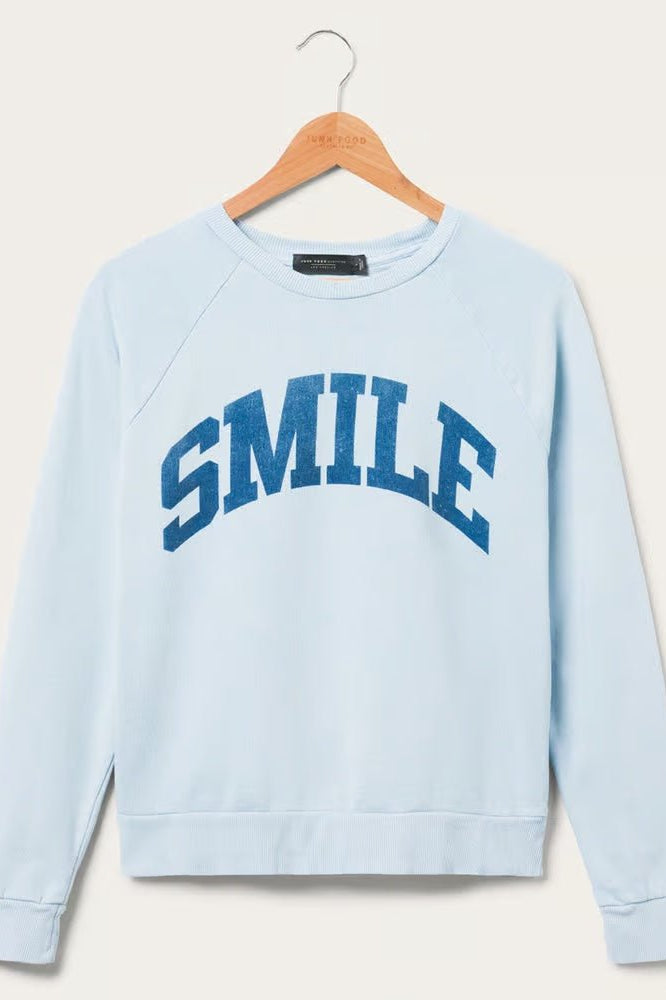 Shop Junk Food Junk Food Womens Smile Vintage Raglan Pullover T-Shirt for women – premium loungewear and festival fashion at Spoiled Brat