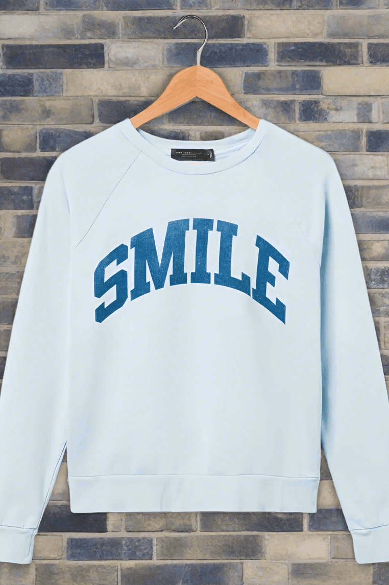 Shop Junk Food Junk Food Womens Smile Vintage Raglan Pullover T-Shirt for women – premium loungewear and festival fashion at Spoiled Brat