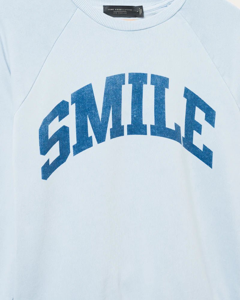 Shop Junk Food Junk Food Womens Smile Vintage Raglan Pullover T-Shirt for women – premium loungewear and festival fashion at Spoiled Brat