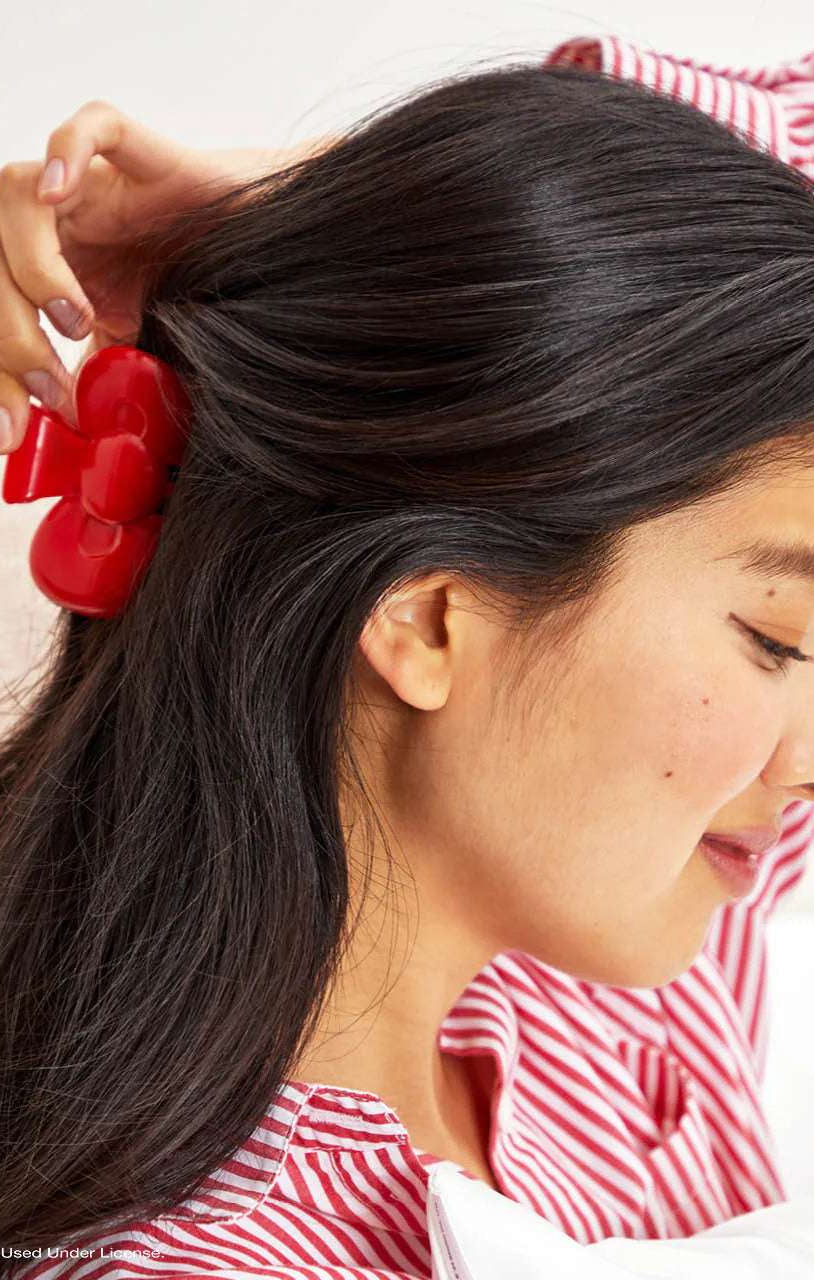 Shop Kitsch Hello Kitty x Kitsch Recycled Plastic Bow Shape Claw Clip Hair Band for women – premium loungewear and festival fashion at Spoiled Brat