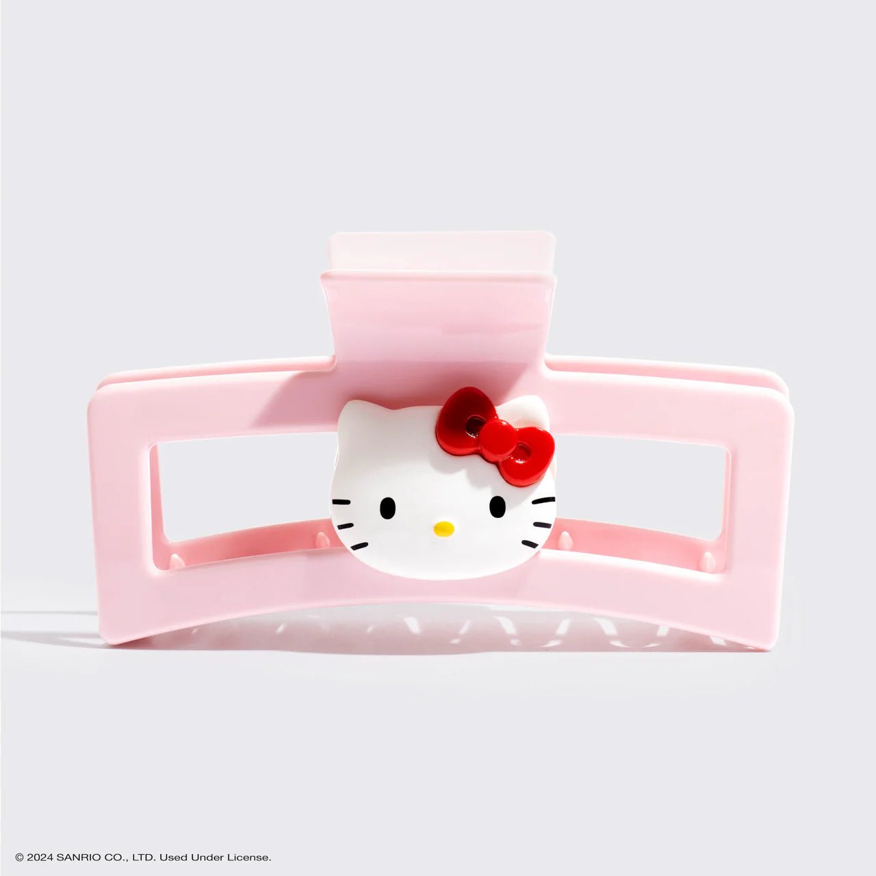 Shop Kitsch Hello Kitty x Kitsch Recycled Plastic Jumbo Open Shape Claw Clip 1pc - Hello Kitty Face Hair Band for women – premium loungewear and festival fashion at Spoiled Brat