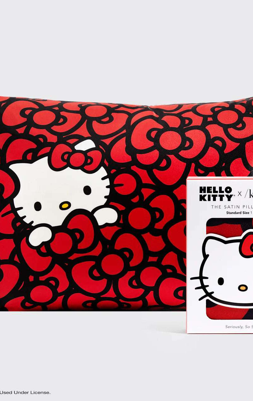 Shop Kitsch Hello Kitty x Kitsch Satin Pillowcase - Hello Kitty Bathes in a Sea of Bows Pillow for women – premium loungewear and festival fashion at Spoiled Brat