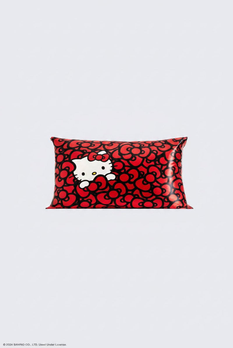 Shop Kitsch Hello Kitty x Kitsch Satin Pillowcase - Hello Kitty Bathes in a Sea of Bows Pillow for women – premium loungewear and festival fashion at Spoiled Brat
