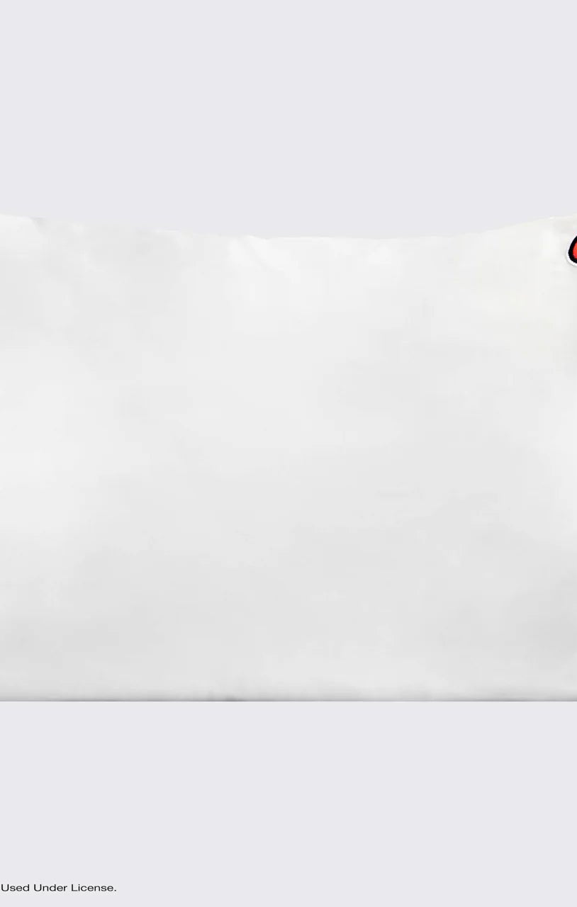 Shop Kitsch Hello Kitty x Kitsch Satin Pillowcase - Solid Ivory Hello Kitty Bow Pillow for women – premium loungewear and festival fashion at Spoiled Brat