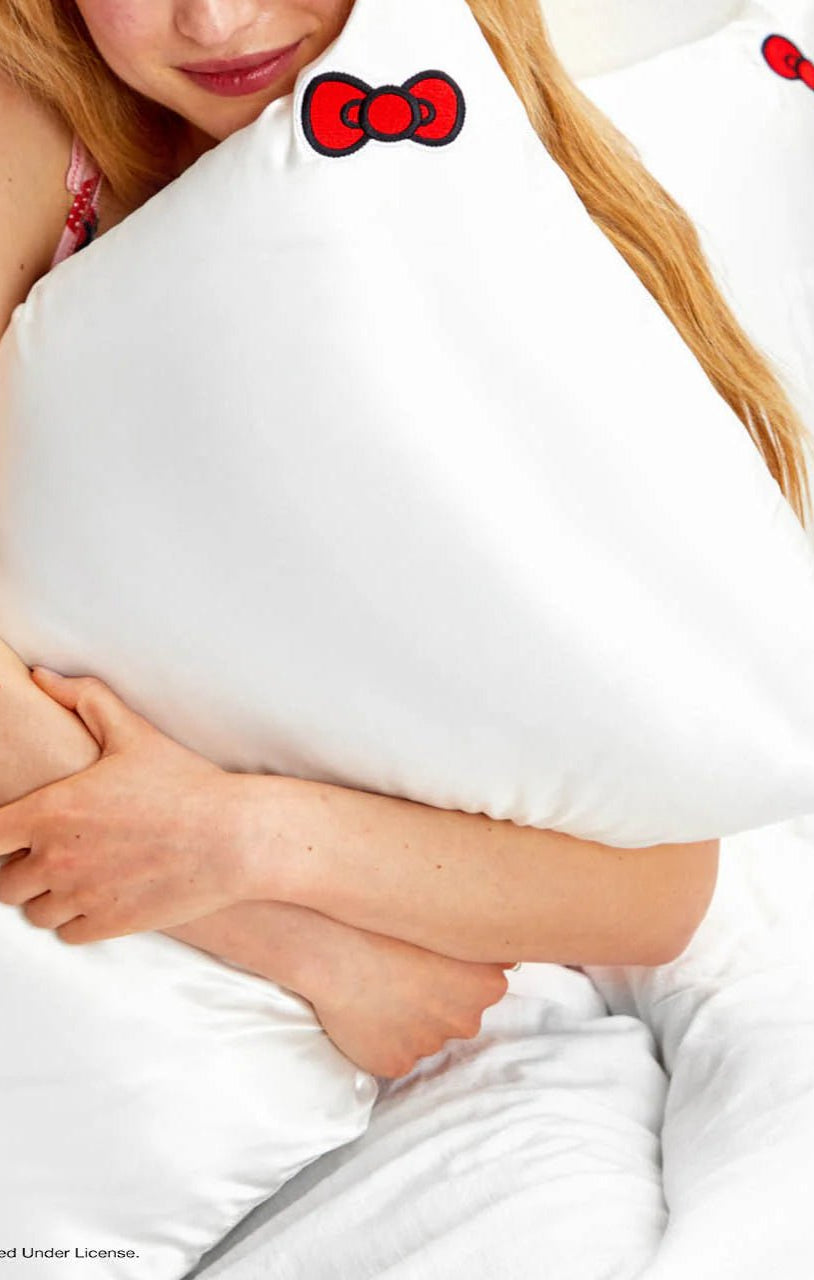 Shop Kitsch Hello Kitty x Kitsch Satin Pillowcase - Solid Ivory Hello Kitty Bow Pillow for women – premium loungewear and festival fashion at Spoiled Brat