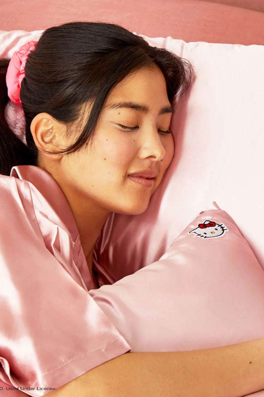 Shop Kitsch Hello Kitty x Kitsch Satin Pillowcase - Solid Pink Hello Kitty Face Pillow for women – premium loungewear and festival fashion at Spoiled Brat