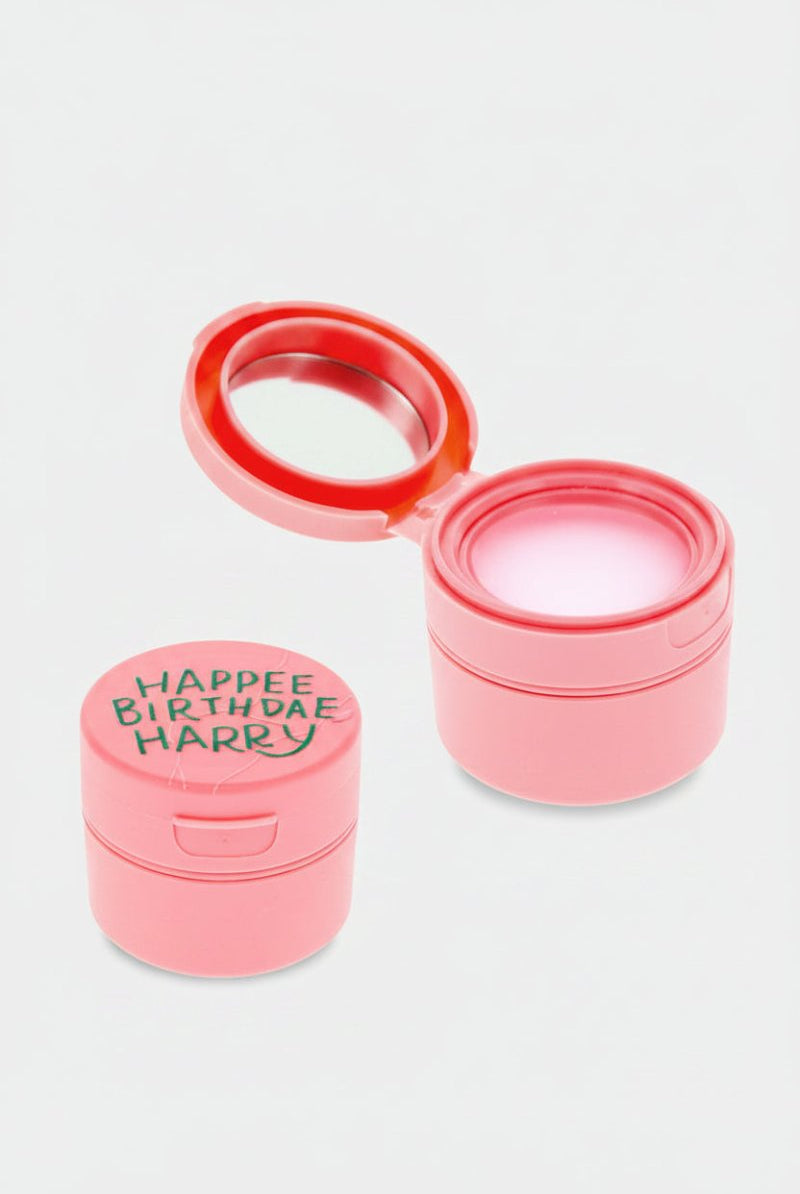 Shop Mad Beauty Mad Beauty Harry Potter Harry's Birthdae Cake Lip balm Lip Balm for women – premium loungewear and festival fashion at Spoiled Brat