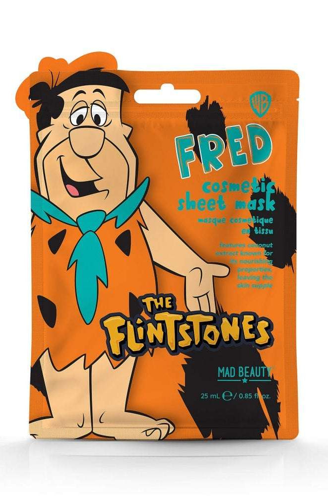 Shop Mad Beauty Mad Beauty Warner Brothers Flintstones Cosmetic Sheet Mask as seen on Karen Hauer Face Mask for women – premium loungewear and festival fashion at Spoiled Brat