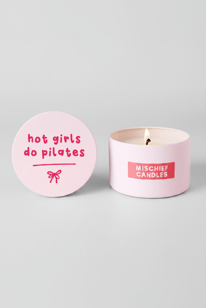 Shop Mischief Candles Hot Girls Do Pilates Pink Tin Candle Candles for women – premium loungewear and festival fashion at Spoiled Brat