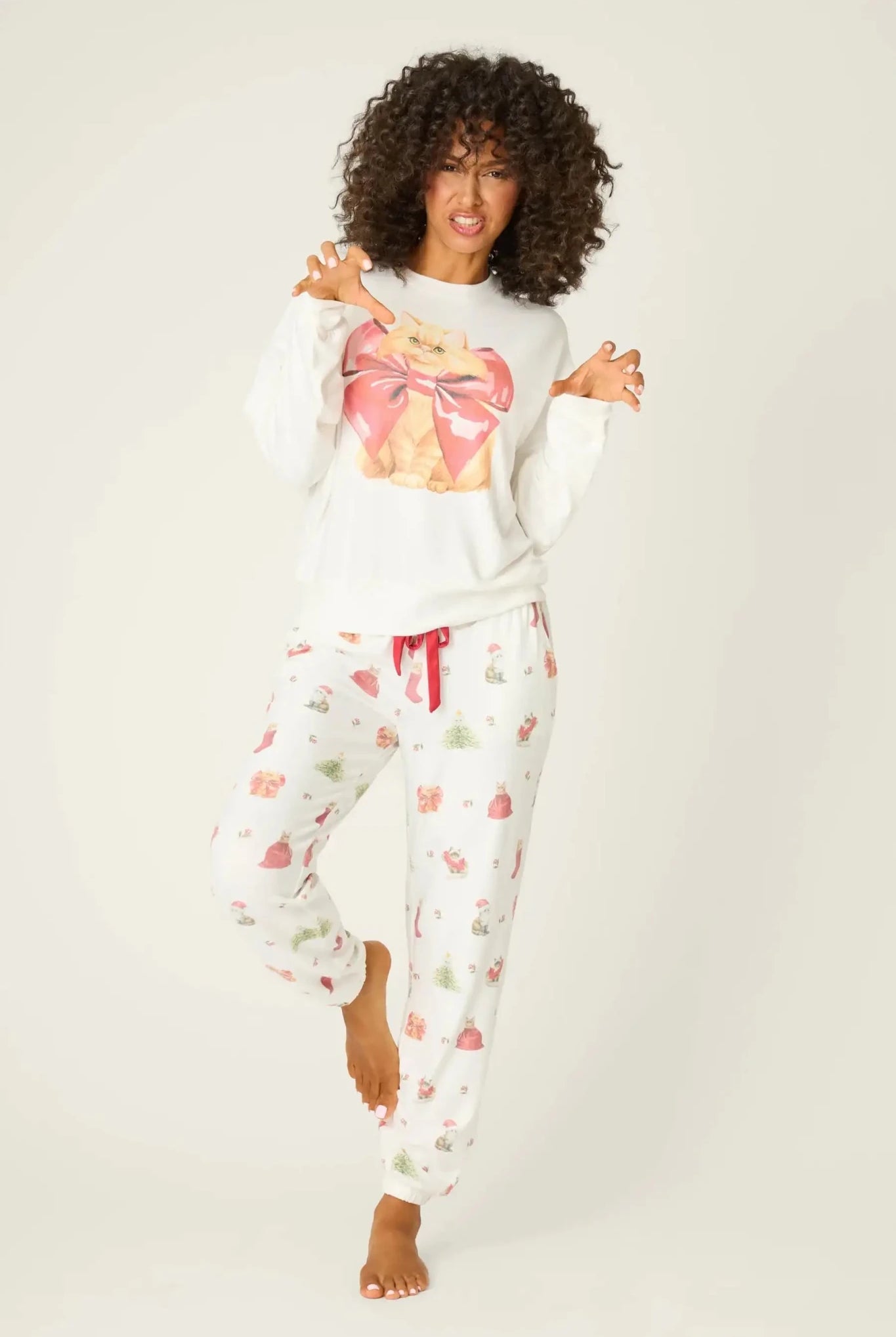 Shop PJ Salvage PJ Salvage Feline Festive Cat Print Sweater as seen on Chloe Sims Sweater for women – premium loungewear and festival fashion at Spoiled Brat