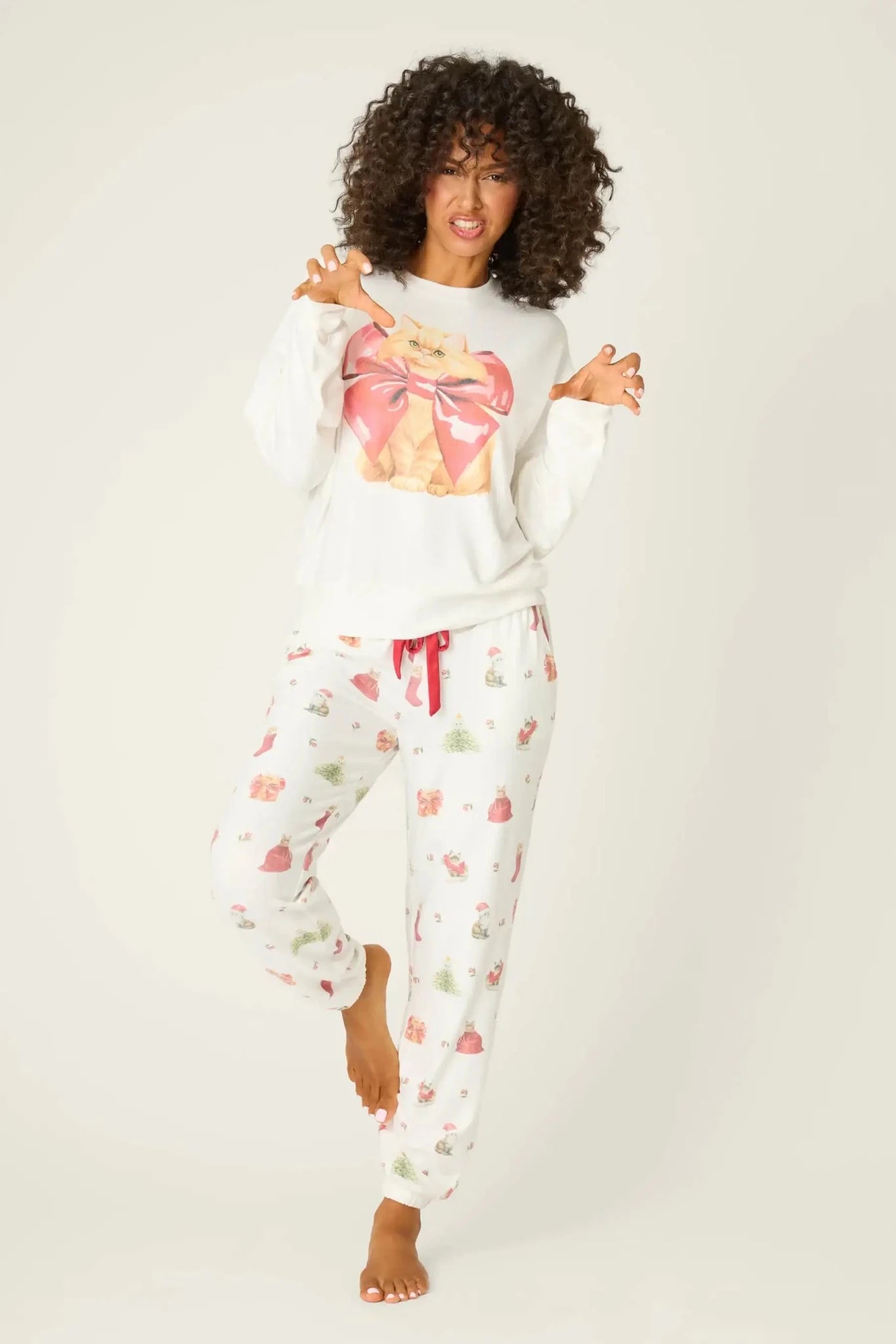 Shop PJ Salvage PJ Salvage Feline Festive Cat Print Sweater as seen on Chloe Sims Sweater for women – premium loungewear and festival fashion at Spoiled Brat