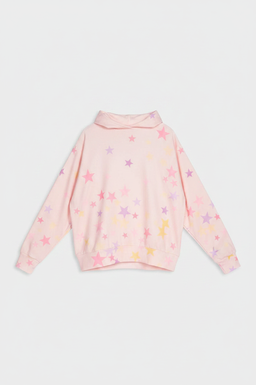 Pink Pj Salvage sweater with star patterns on a light gray background