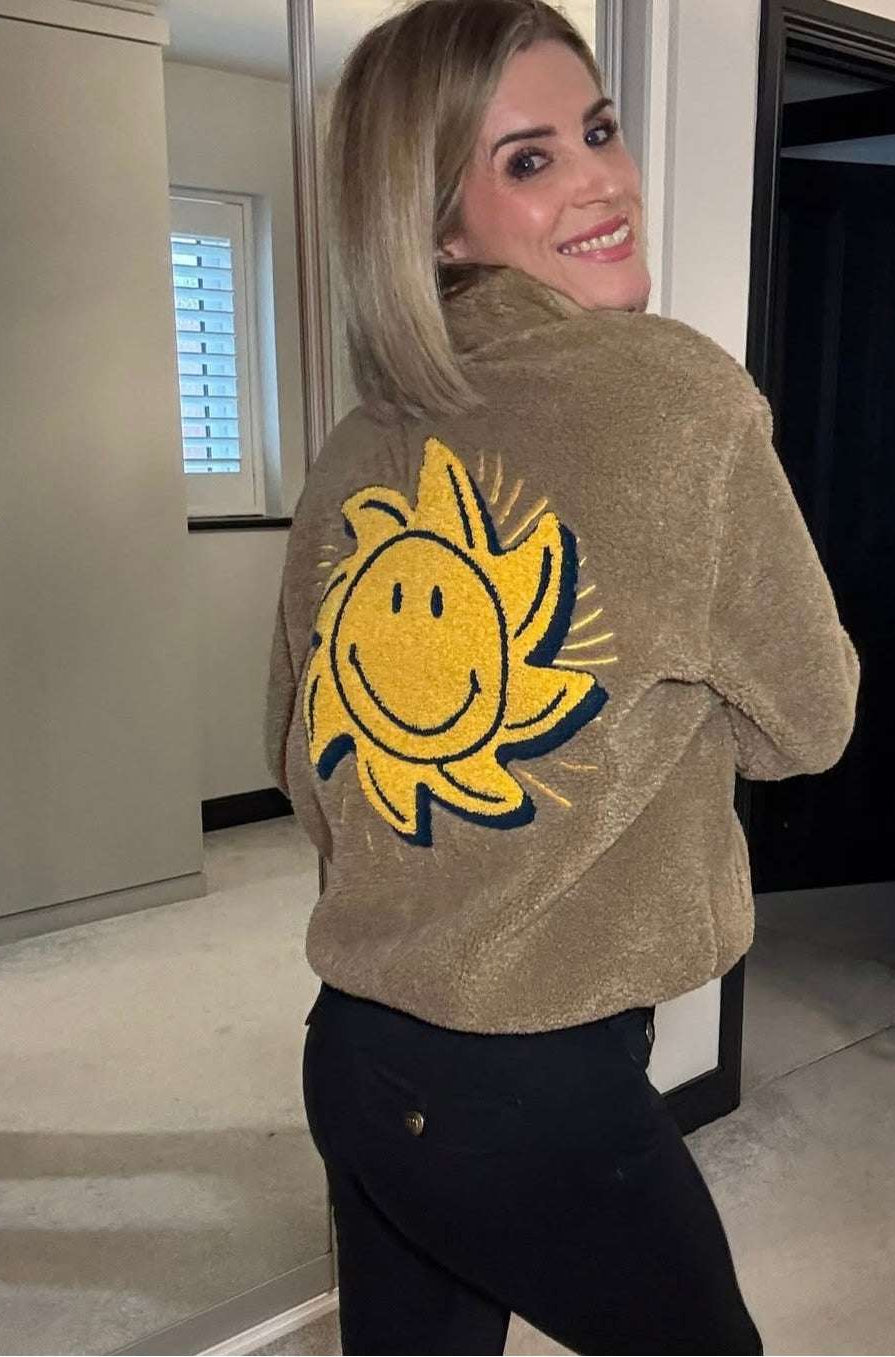Shop Samii Ryan Samii Ryan Smiley® Sunshine Sherpa Jacket as seen on Sarah Jayne Dunn Jacket for women – premium loungewear and festival fashion at Spoiled Brat