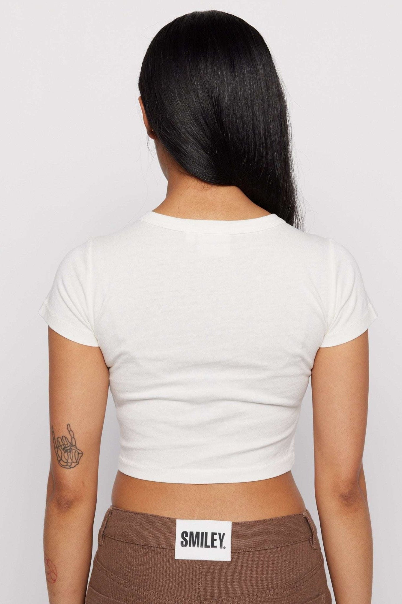 Shop Samii Ryan Samii Ryan x Smiley® Gimme Space Baby Tee T-Shirt for women – premium loungewear and festival fashion at Spoiled Brat