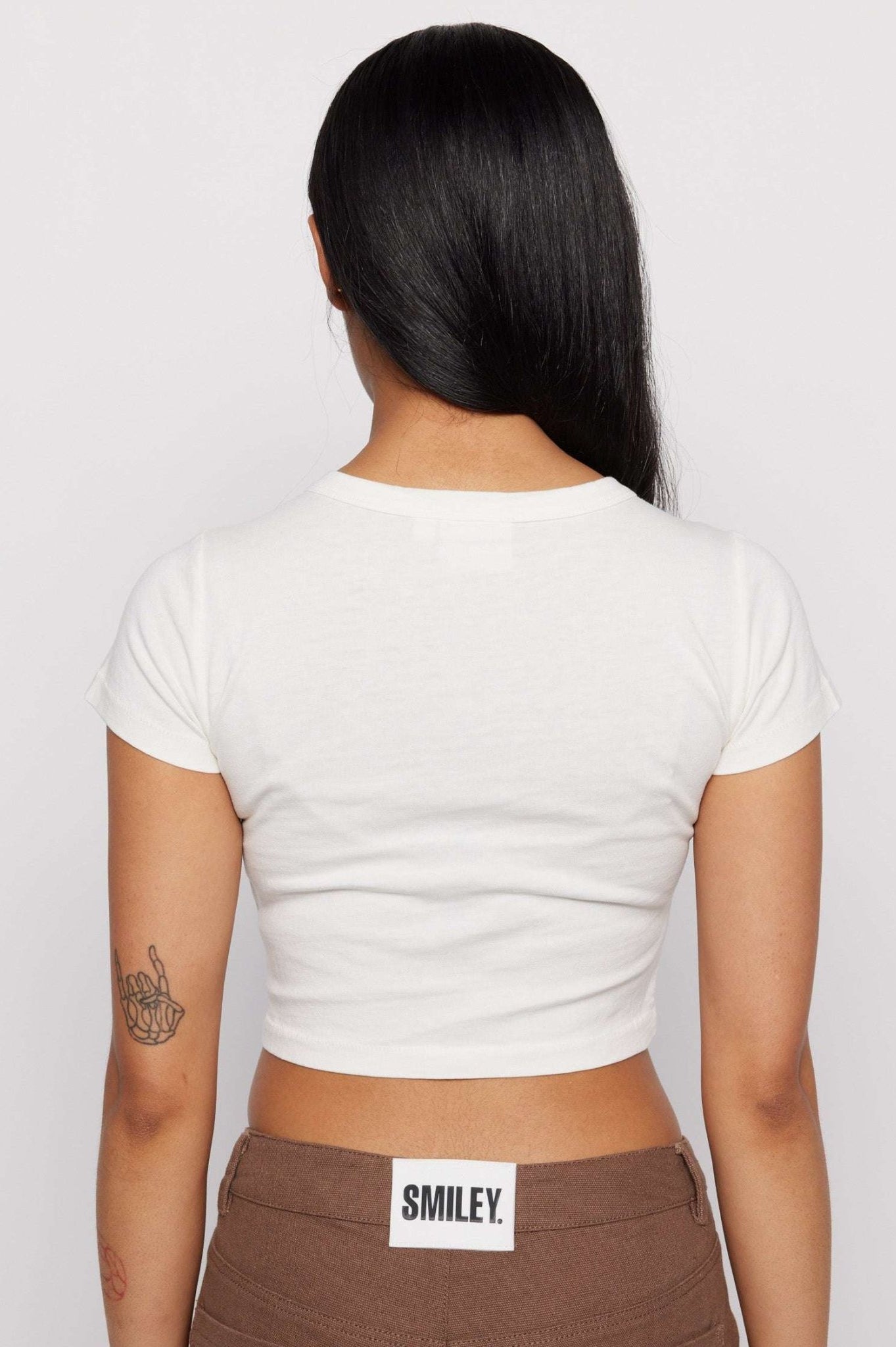 Shop Samii Ryan Samii Ryan x Smiley® Gimme Space Baby Tee T-Shirt for women – premium loungewear and festival fashion at Spoiled Brat