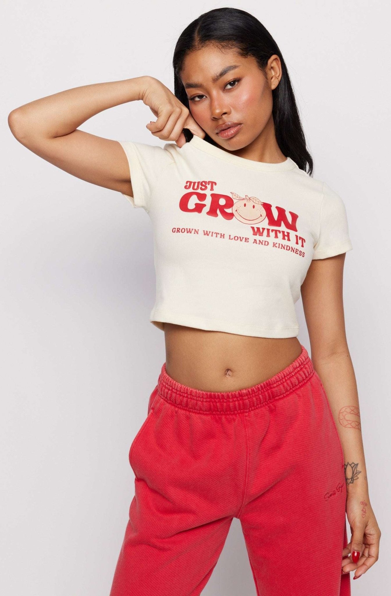 Shop Samii Ryan Samii Ryan x Smileyworld® Just Grow With It Baby Tee T-Shirt for women – premium loungewear and festival fashion at Spoiled Brat