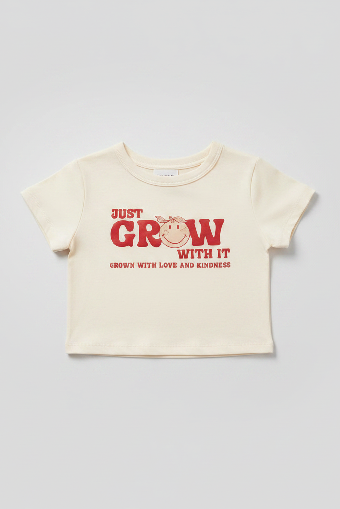 Beige t-shirt with red text on a gray background
