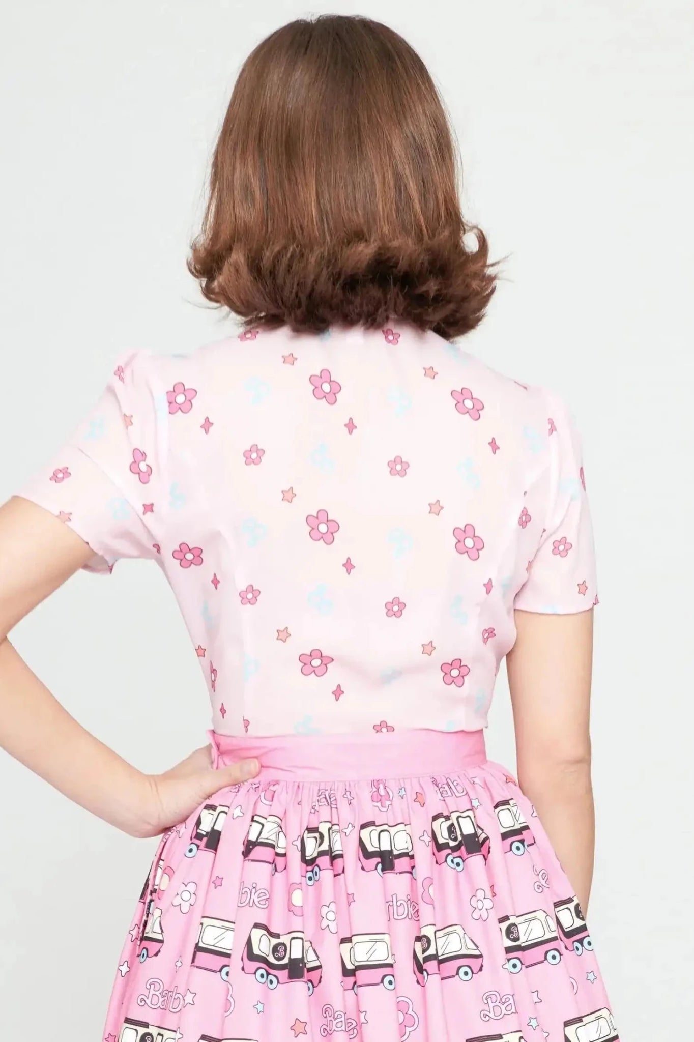 Shop Unique Vintage Barbie X Unique Vintage 1970s Pink Barbie Floral Print Bow Blouse Blouse for women – premium loungewear and festival fashion at Spoiled Brat